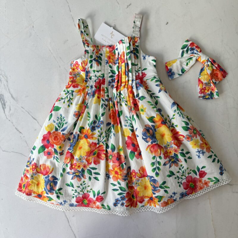 AC VESTIDO FLORES COLORES VIVOS CON MOÑO TALLA 12 MESES